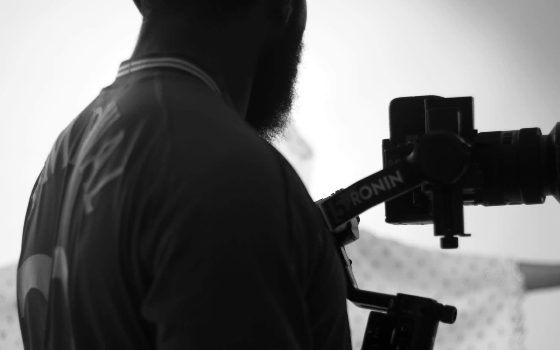Aliyu filming on a gimbal in the studio